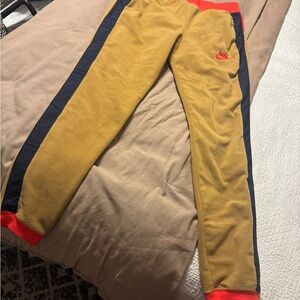 Nike Mustard and Black Joggers with Red Accents